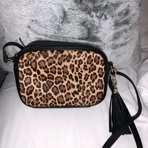 Fur cheetah purse